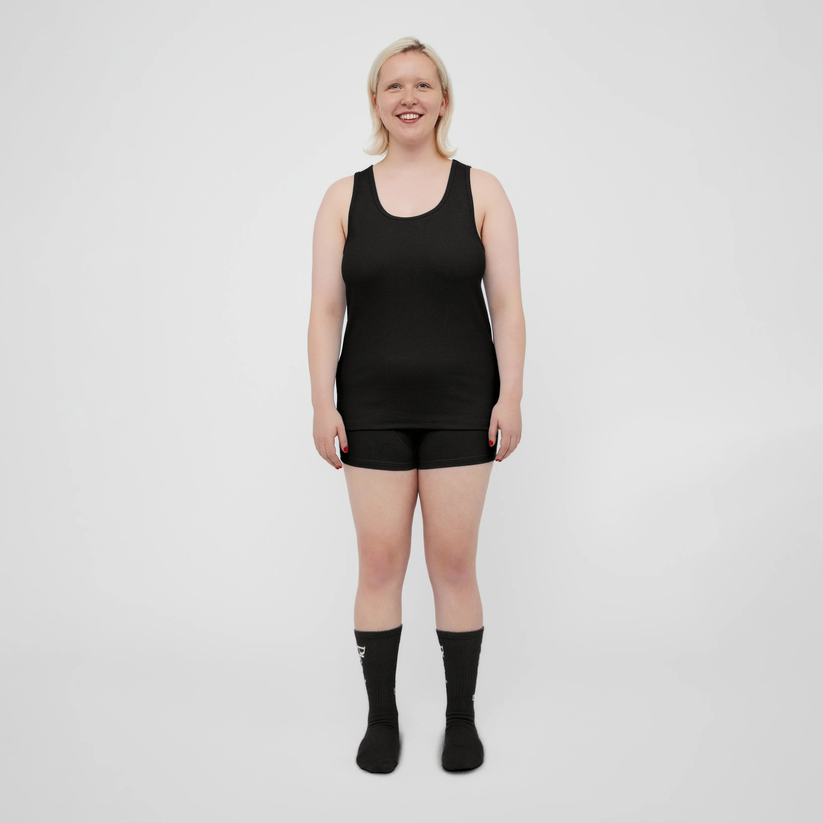 The Pleasing Ribbed Tank in Black - Image 13